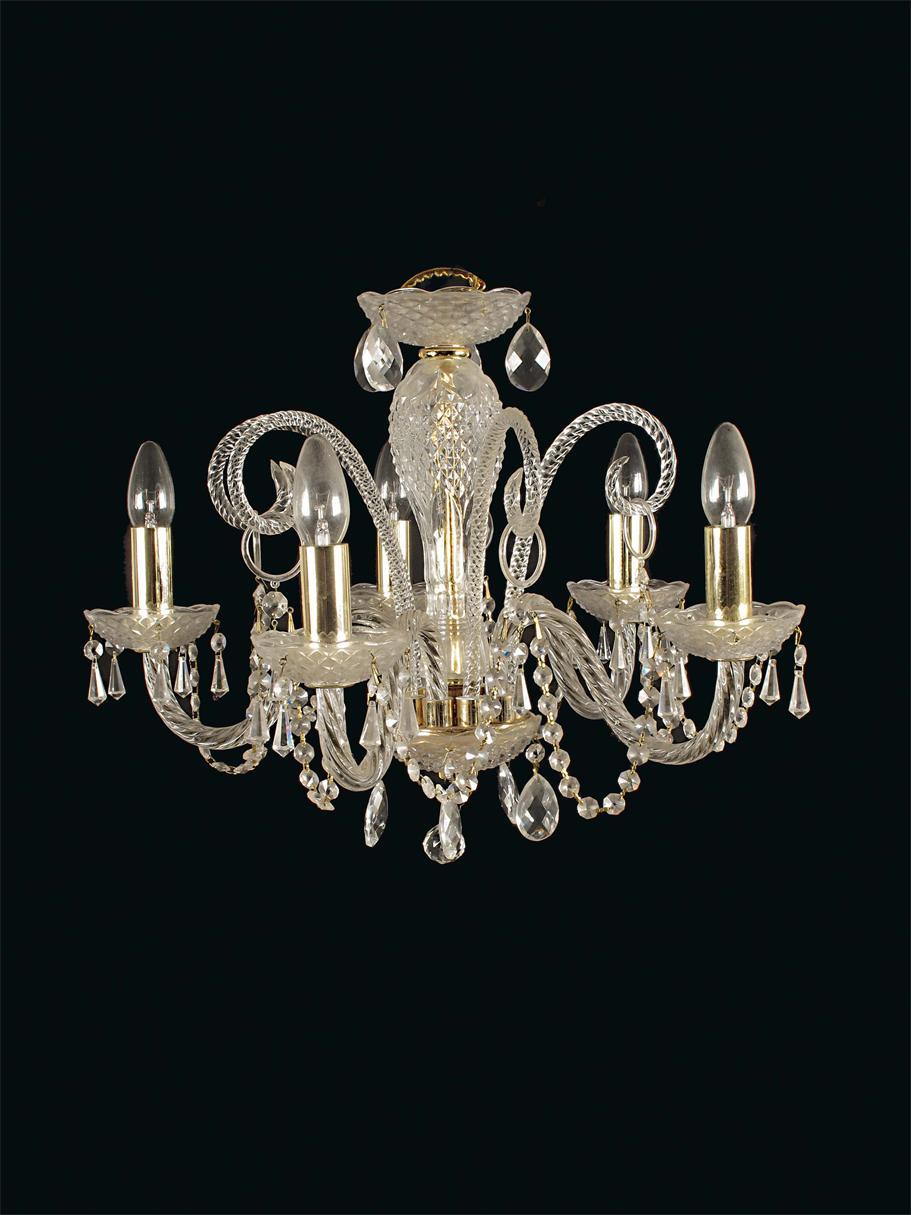 Appraisal: A pair of moulded glass five light chandeliers