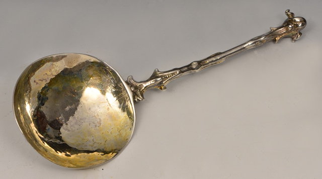 Appraisal: AN TH CENTURY SPOON with outsized bowl and stylised handle