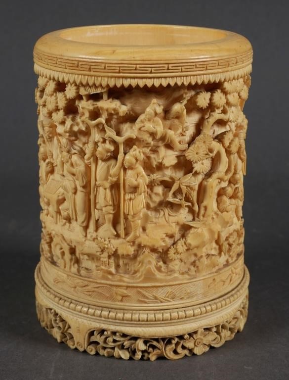 Appraisal: Ornately carved scholar s ivory brush pot cup shape with