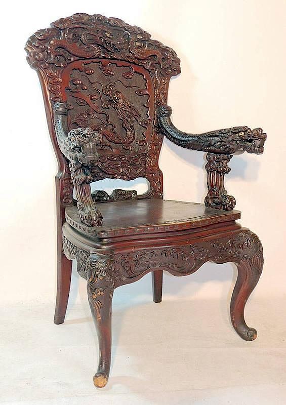 Appraisal: Chinese Hall Chair th Century Heavily carved with dragon-form handles