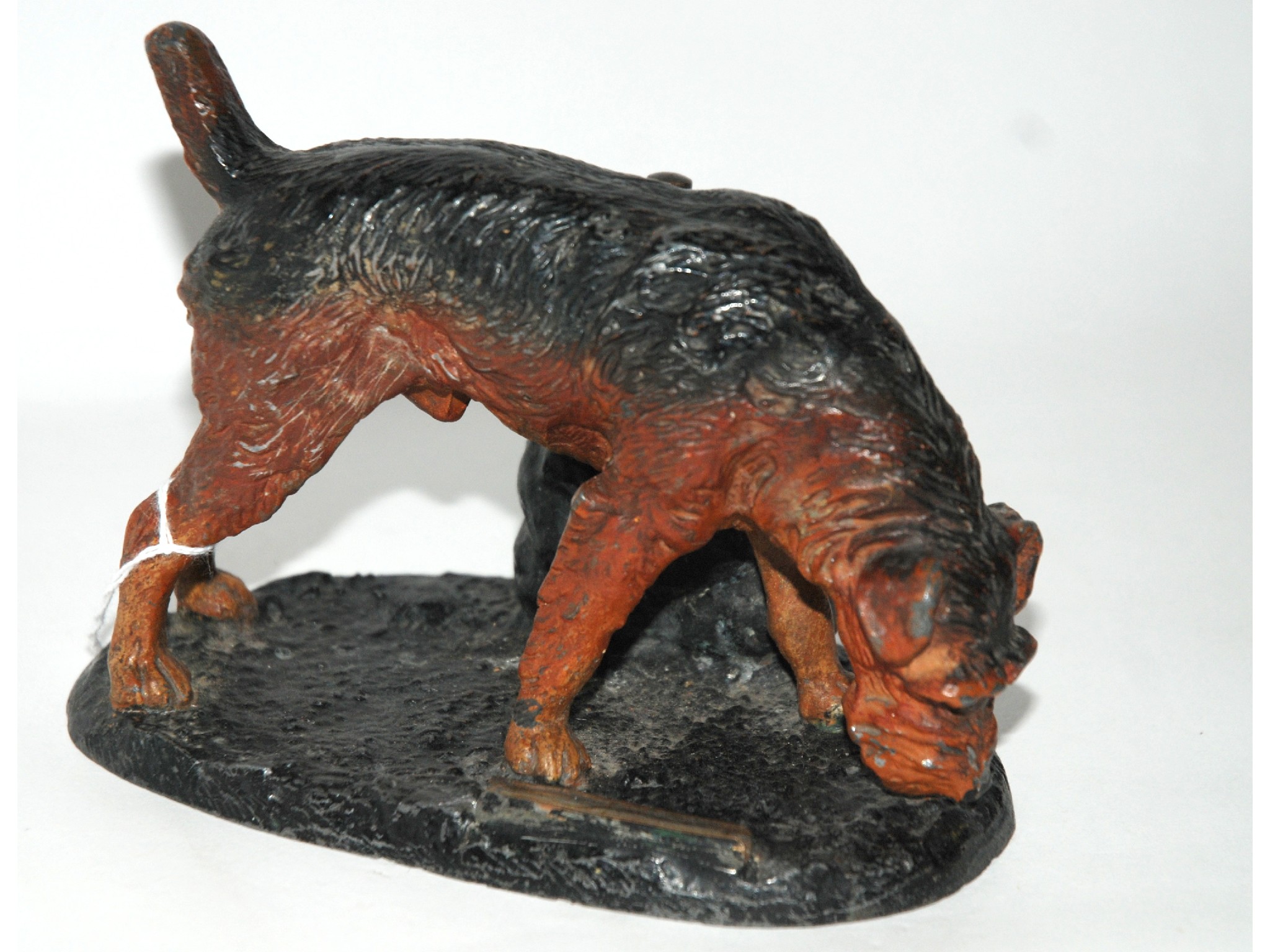 Appraisal: A metal figure of a dog the base stamped Austria