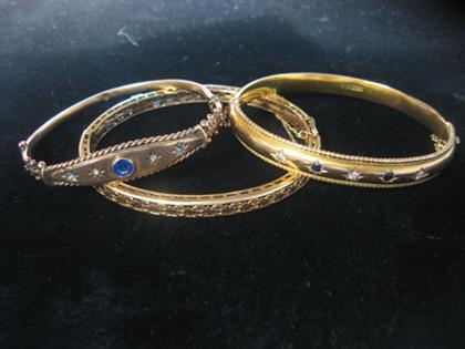 Appraisal: Group of three bangle bracelets Of differing karat quality each