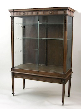 Appraisal: A Large Traditionally Styled Display Cabinet A large display cabinet