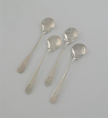 Appraisal: A set of four George III salt spoons with waisted