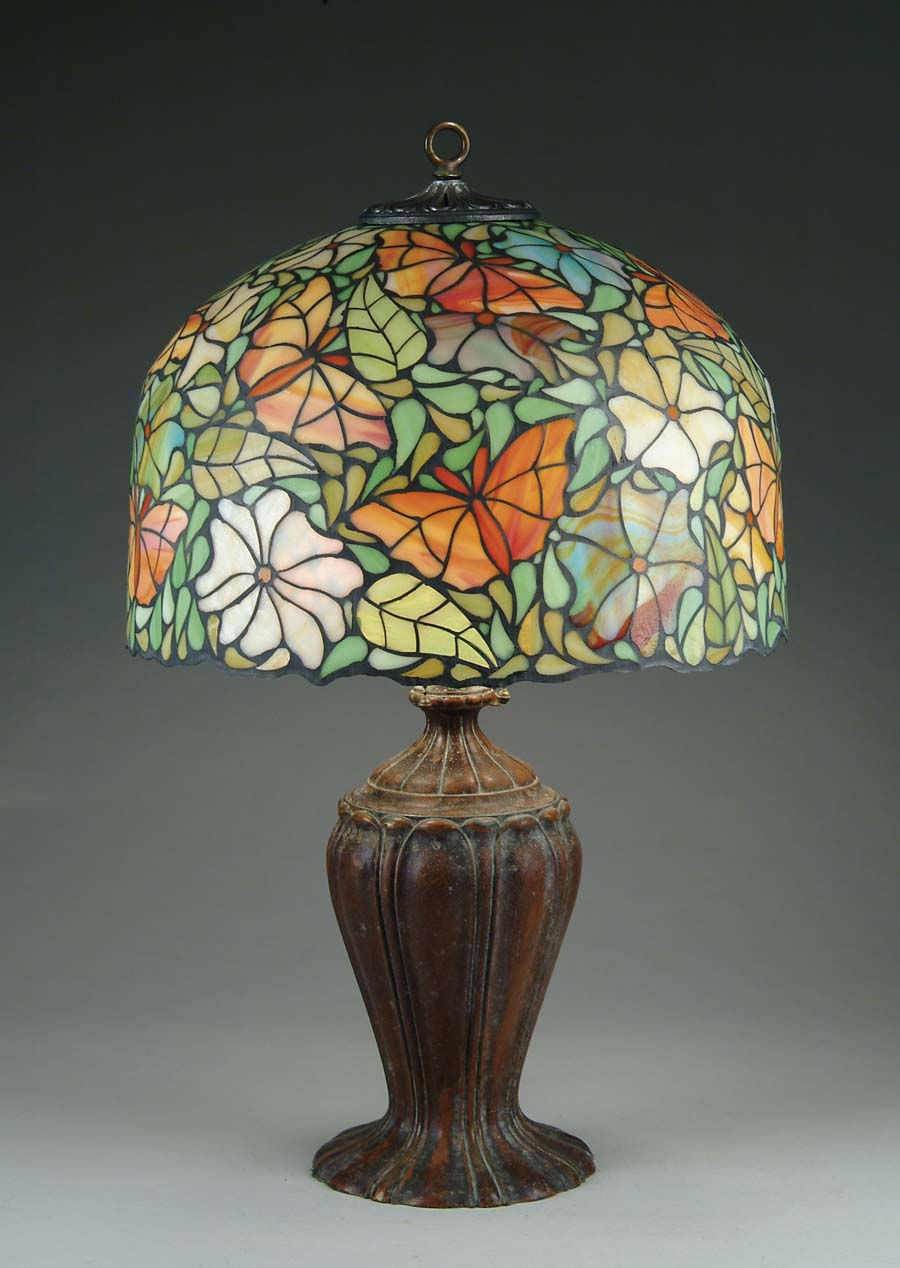 Appraisal: FLORAL STAINED GLASS LAMP Lovely contemporary stained glass shade has