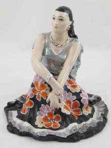 Appraisal: A Russian ceramic model of a woman in gypsy style