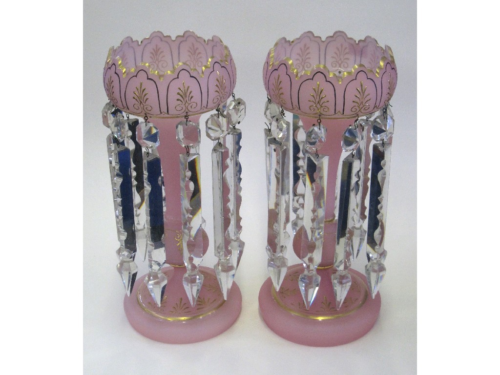 Appraisal: Pair of pink glass lustres with gilt decoration