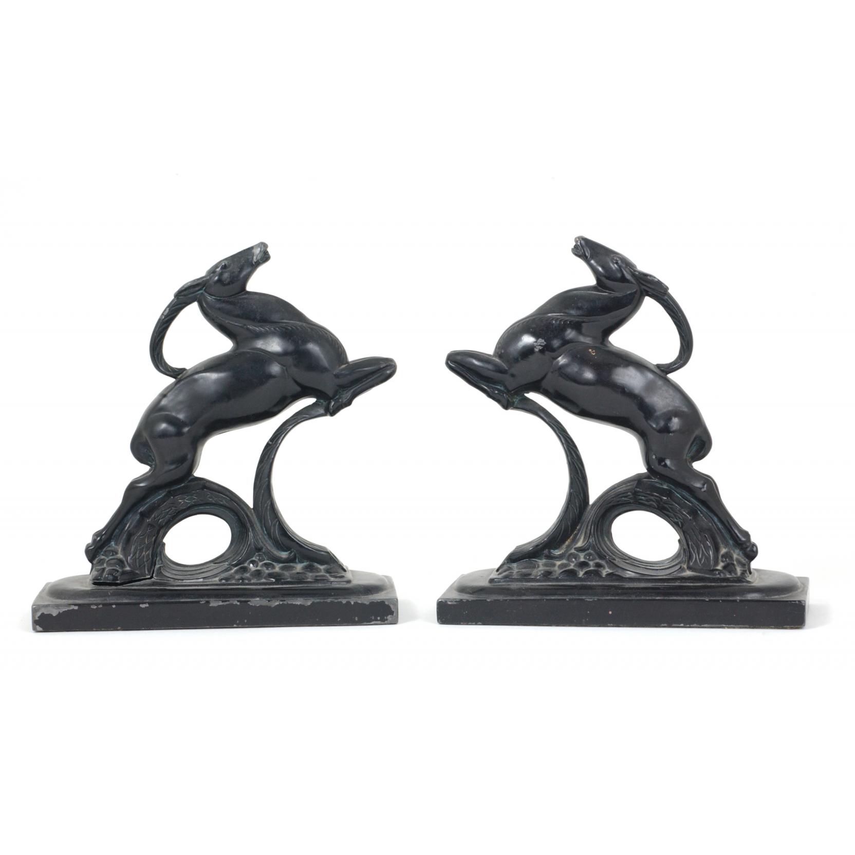 Appraisal: Pair of Art Deco Impala Bookends in black paint in