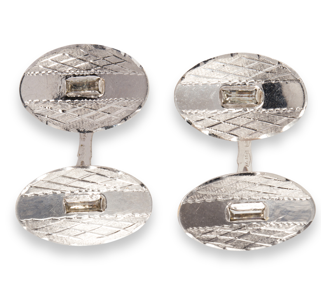 Appraisal: A PAIR OF EIGHTEEN KARAT WHITE GOLD CUFFLINKS A pair