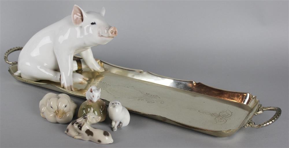 Appraisal: GROUP OF ROYAL COPENHAGEN ANIMAL FIGURINES including a ceramic pig