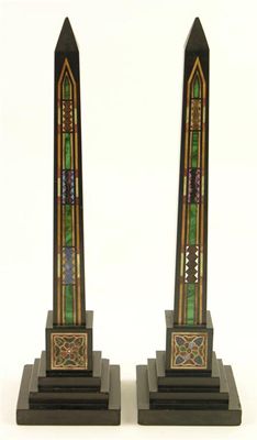 Appraisal: A pair of polished slate and specimen mineral obelisks with