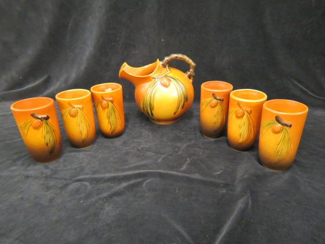 Appraisal: Roseville Pottery Pinecone Beverage Set brown ball shape pitcher and