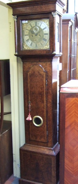 Appraisal: An th century eight day figured walnut long case clock