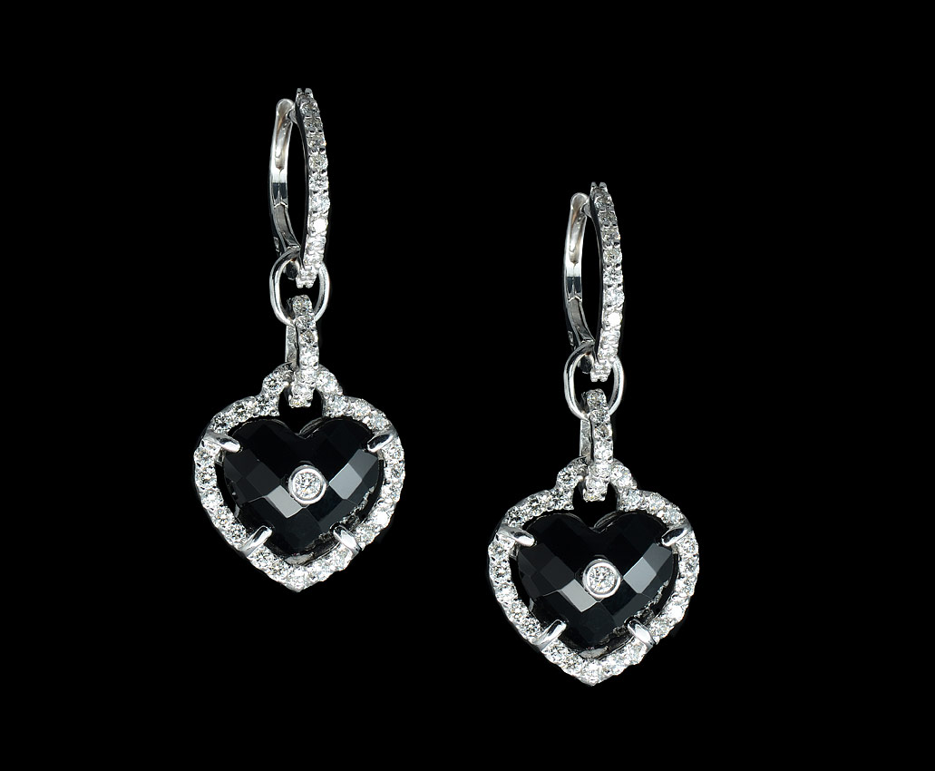 Appraisal: k DIAMOND BLACK ONYX EARRINGS K white gold earrings centering