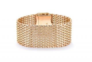 Appraisal: A WIDE KARAT YELLOW GOLD BRACELET An intricate woven pattern