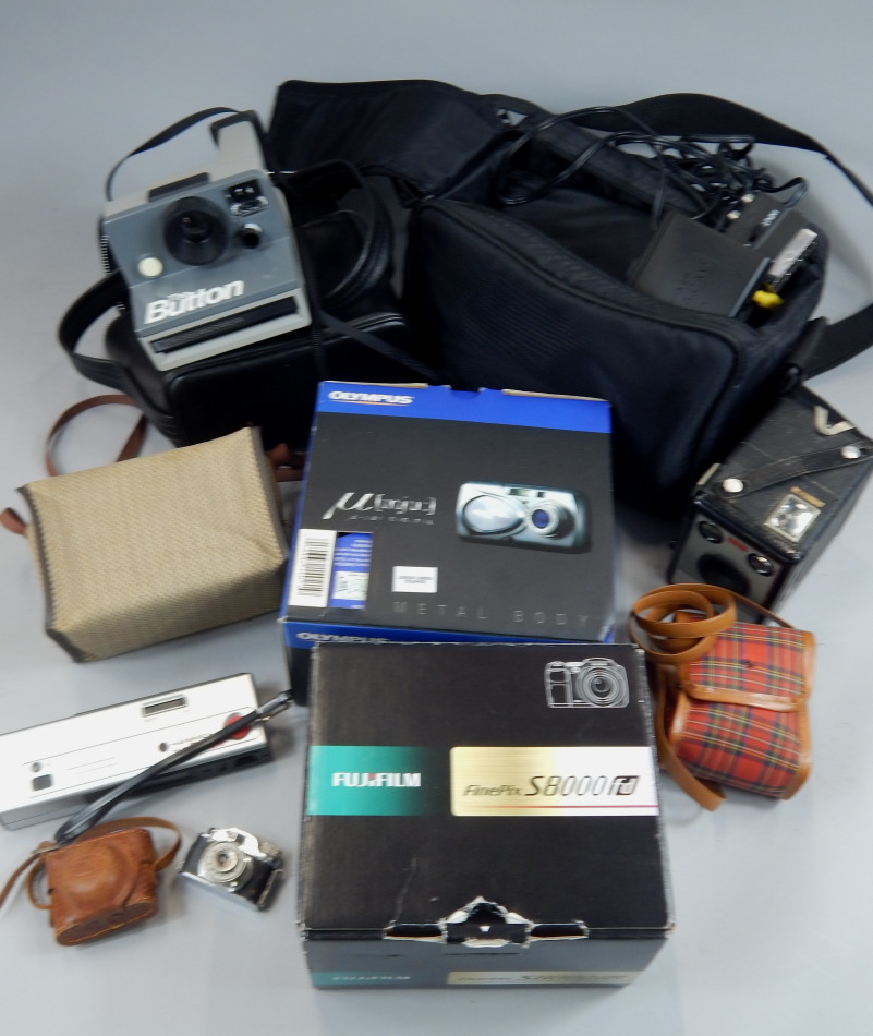 Appraisal: A quantity of camera equipment a video camera a Fuji