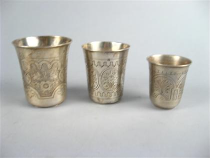 Appraisal: Three Russian silver vodka cups late th century various makers