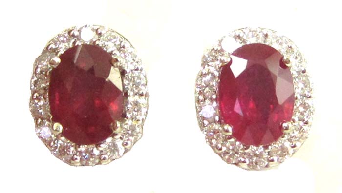 Appraisal: PAIR OF DIAMOND AND RUBY EARRINGS IN FOURTEEN KARAT GOLD