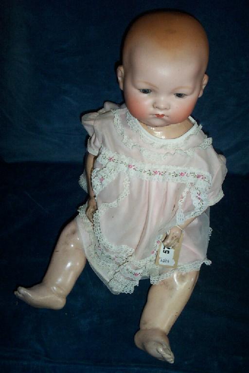 Appraisal: A German Armand Marseille bisque headed baby doll with closing