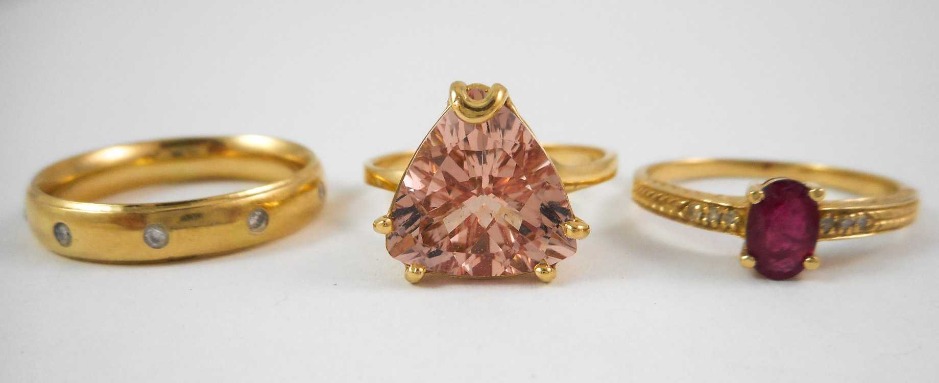 Appraisal: THREE FOURTEEN KARAT YELLOW GOLD RINGS including a size -