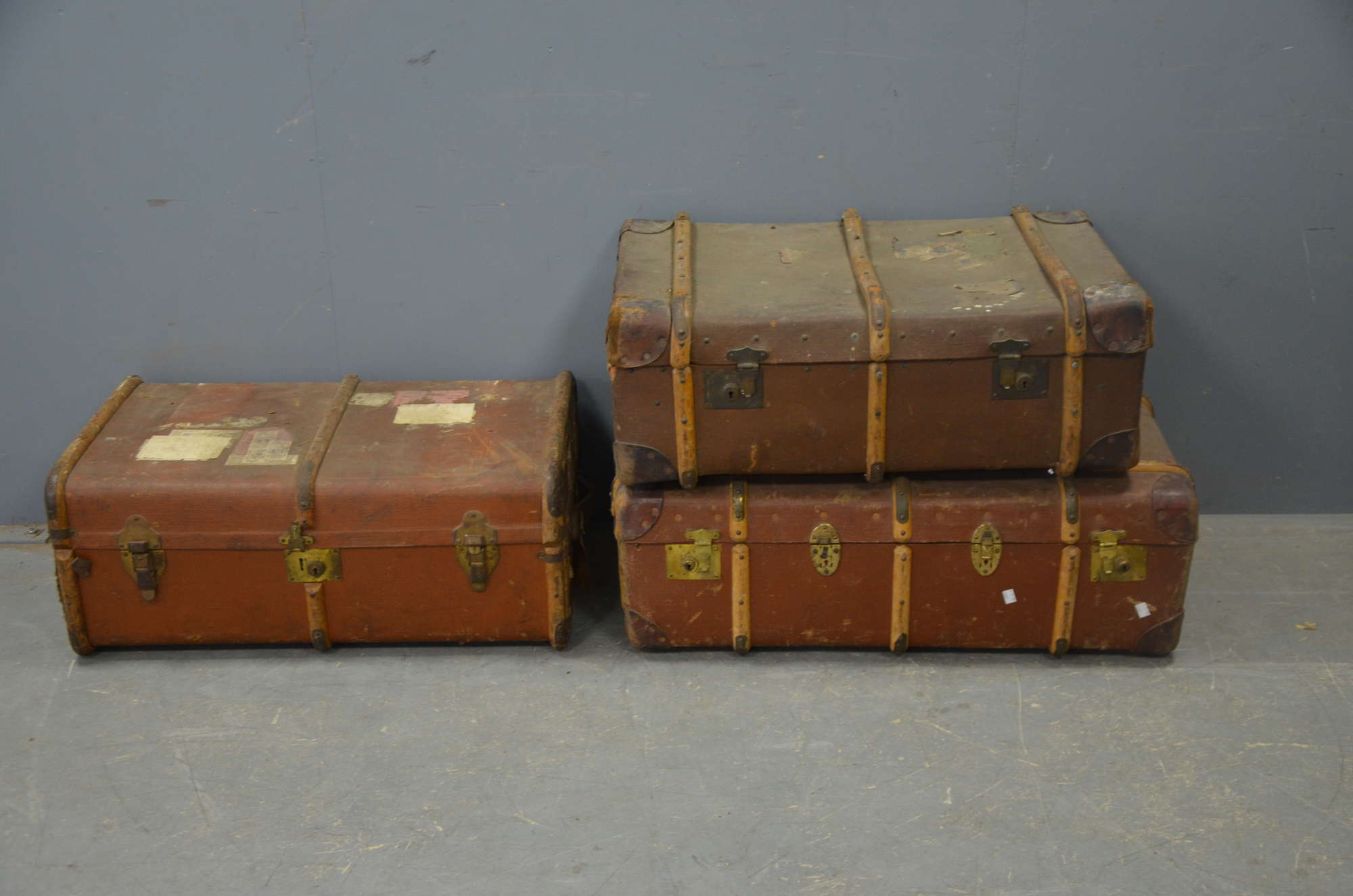 Appraisal: Three early th C luggage trunks