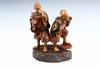 Appraisal: CARVED WOOD AND IVORY JAPANESE CABINET FIGURE - Pair of