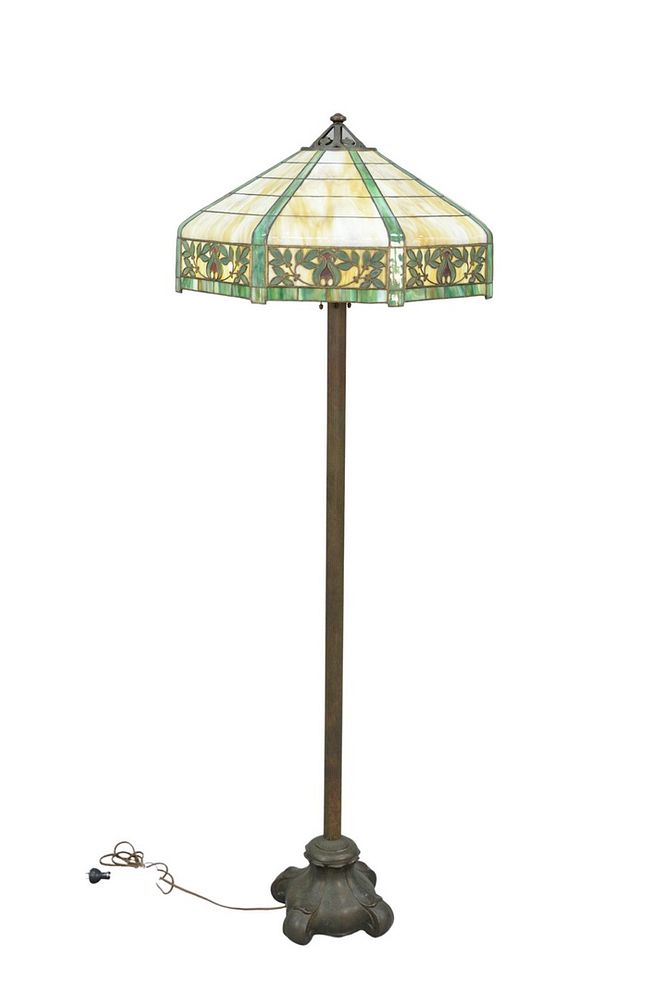 Appraisal: Floor lamp with leaded shade with leaves and red designs