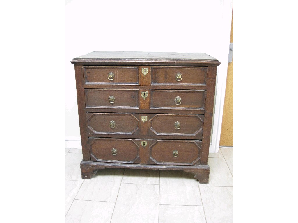 Appraisal: An th Century oak Chest of four long drawers with