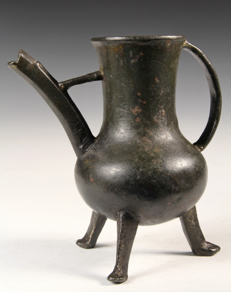 Appraisal: ANCIENT BRONZE FOOTED PITCHER - th c European probably Frankish