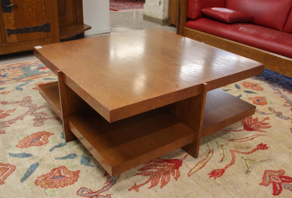 Appraisal: CRAFTSMAN STYLE OAK COCKTAIL TABLE a square -tier design unsigned