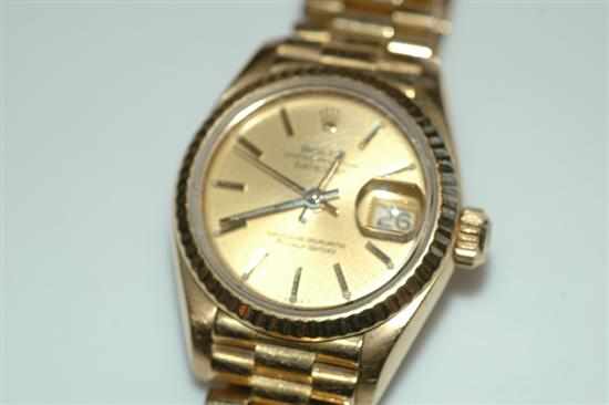 Appraisal: A LADIES ROLEX OYSTER PERPETUAL DATEJUST AUTOMATIC WRISTWATCH WITH BATON