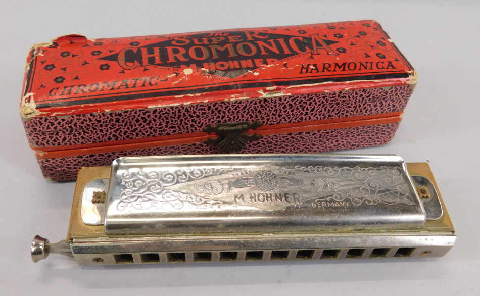 Appraisal: A Hohner Super Chromonica harmonica in original box