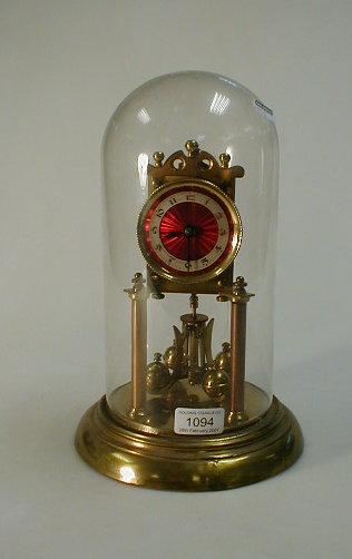 Appraisal: A thC gilt metal dome clock with red enamel style