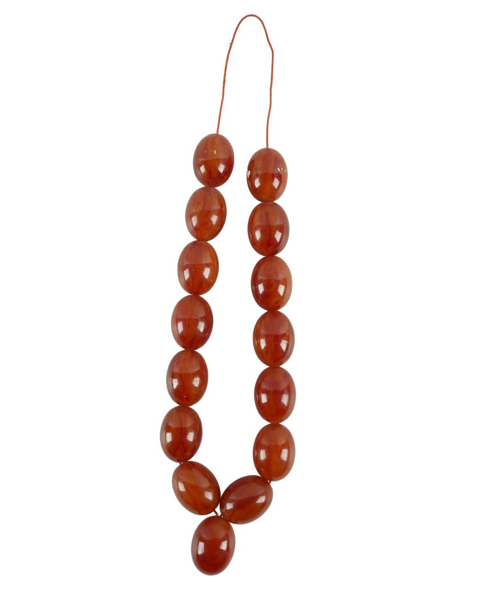 Appraisal: STRING OF AMBER BEADScomprising fifteen beads Provenance The Estate of