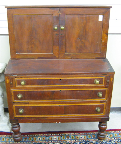 Appraisal: EMPIRE MAHOGANY SECRETARY American c - the base section a