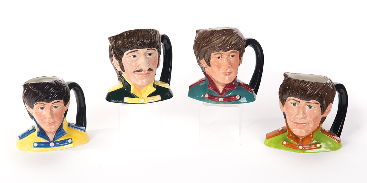 Appraisal: FOUR ROYAL DOULTON CHARACTER JUGS OF THE BEATLES England copyright