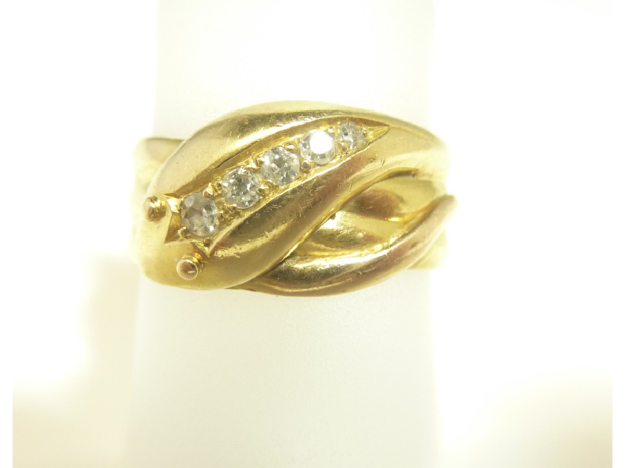 Appraisal: An ct gold and diamond snake ring the head inset