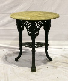 Appraisal: A cast iron garden table with circular stone top cm