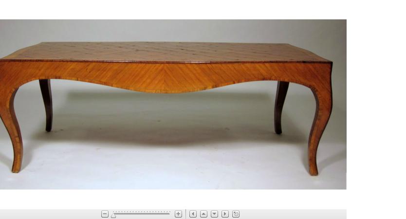 Appraisal: Louis XV style walnut and parquetry low table The shaped