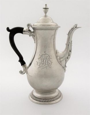 Appraisal: A George III baluster coffee pot on a gadrooned circular