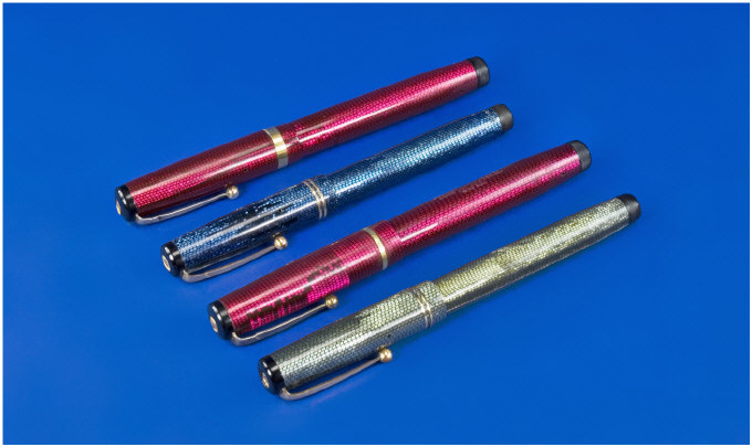 Appraisal: Four Swan Lizard Leverless Pens Comprising Blue L With A