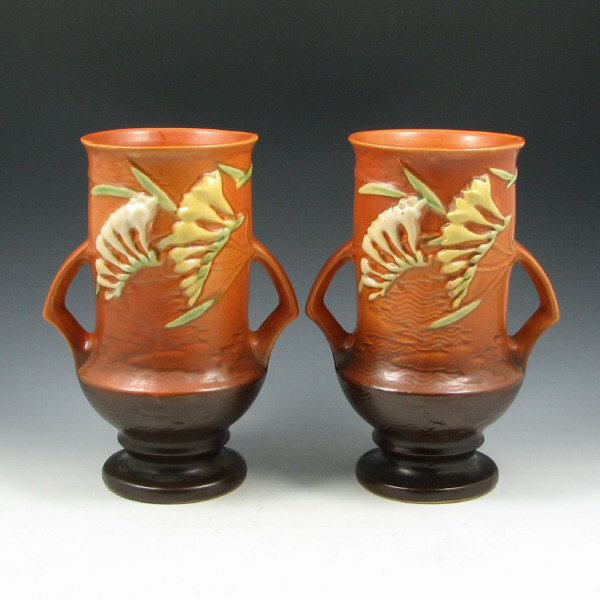 Appraisal: Pair of Roseville Freesia vases in brown Marked Roseville USA