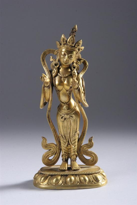 Appraisal: SINO-TIBETAN GILT BRONZE FIGURE OF DEITY Standing on lotus plinth