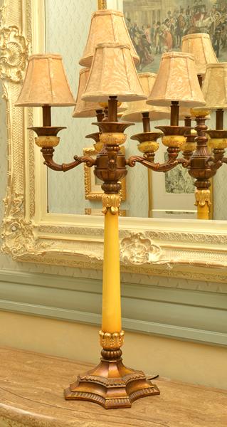 Appraisal: PAIR OF FIVE BRANCH ELECTRIFIED CANDELABRAS MOUNTED ON A SHAPED