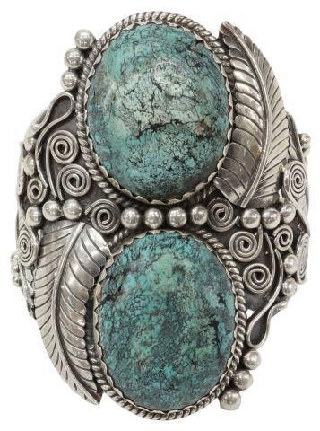 Appraisal: Southwest sterling silver cuff bracelet with two large turquoise cabochons