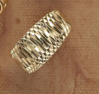 Appraisal: GOLD FASHION RING k yellow gold Italian tapered band with