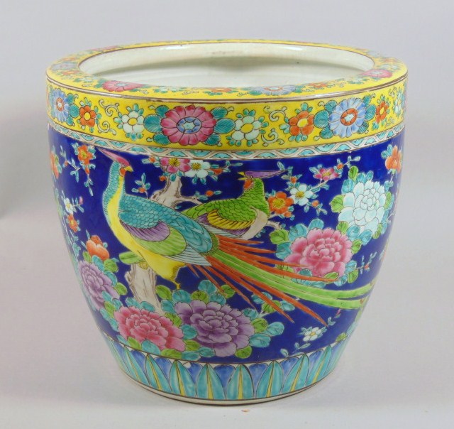 Appraisal: A thC Chinese earthenware jardiniere polychrome decorated overall with Asiatic