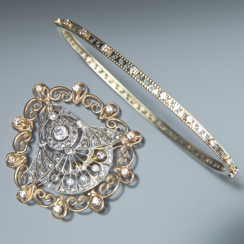 Appraisal: EDWARDIAN ART DECO Edwardian diamond brooch in platinum-topped gold with