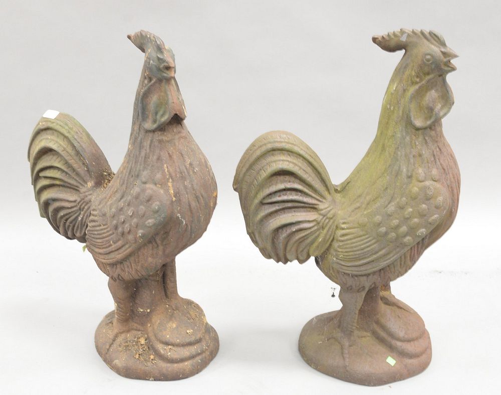 Appraisal: Pair iron roosters ht small hole behind one head Pair