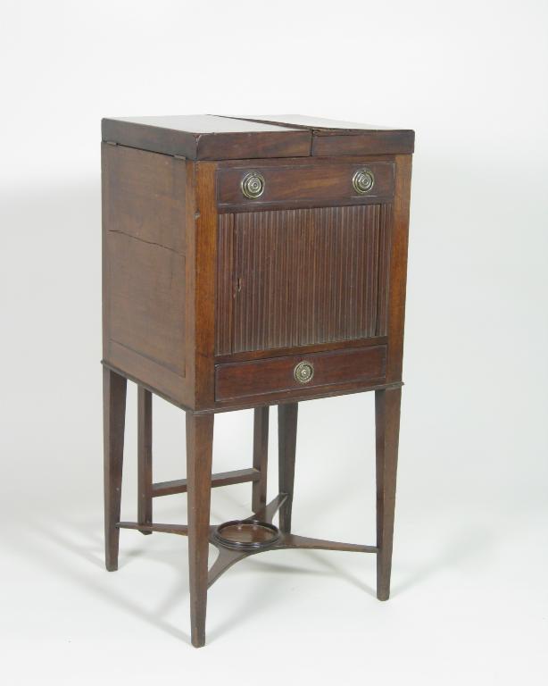 Appraisal: A late Georgian mahogany small square enclosed Washstand with double